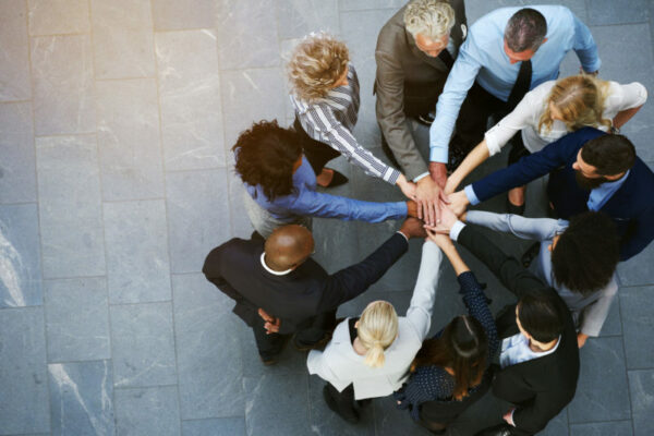 High,Angle,View,Of,A,Team,Of,United,Coworkers,Standing